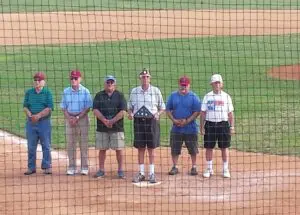 Six veterans on a baseball field