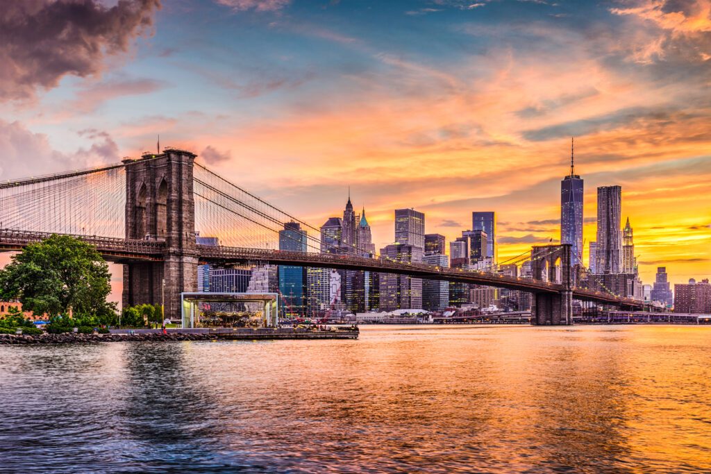 An Image of a Bridge With a City in Background