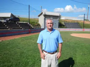 Chuck Radford Standing on a Baseball Ground Headshot