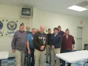 A Group of Men Standing in an Open Space