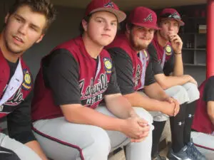 A Group of Baseball Players Siting o n the Bench