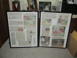 Two Frames With Newspaper Clippings