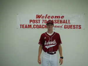 Josh Dotson in a Maroon Color Top Headshot