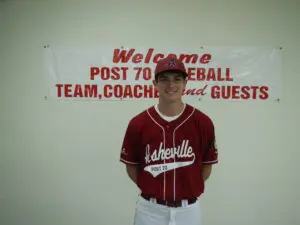 Garrett Blaylock in a Maroon Color Top Headshot