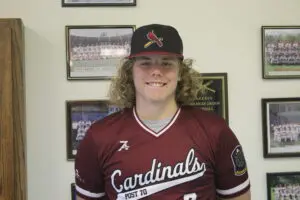 Nick Schultz in a Maroon Color Top Headshot One