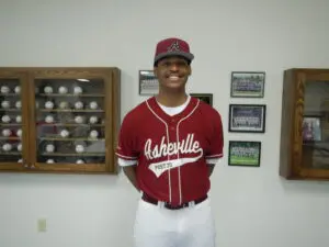 Xavier Stewart smiling and standing in uniform