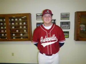 Will Butcher standing and smiling in uniform