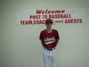 Nate Fore in a Maroon Color Top Headshot