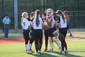 A Group of Women on the Pitch After a Match