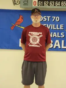 Head Coach Chris Decker standing in his jersey