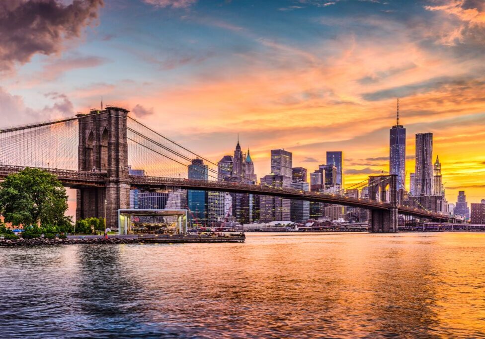 An Image of a Bridge With a City in Background